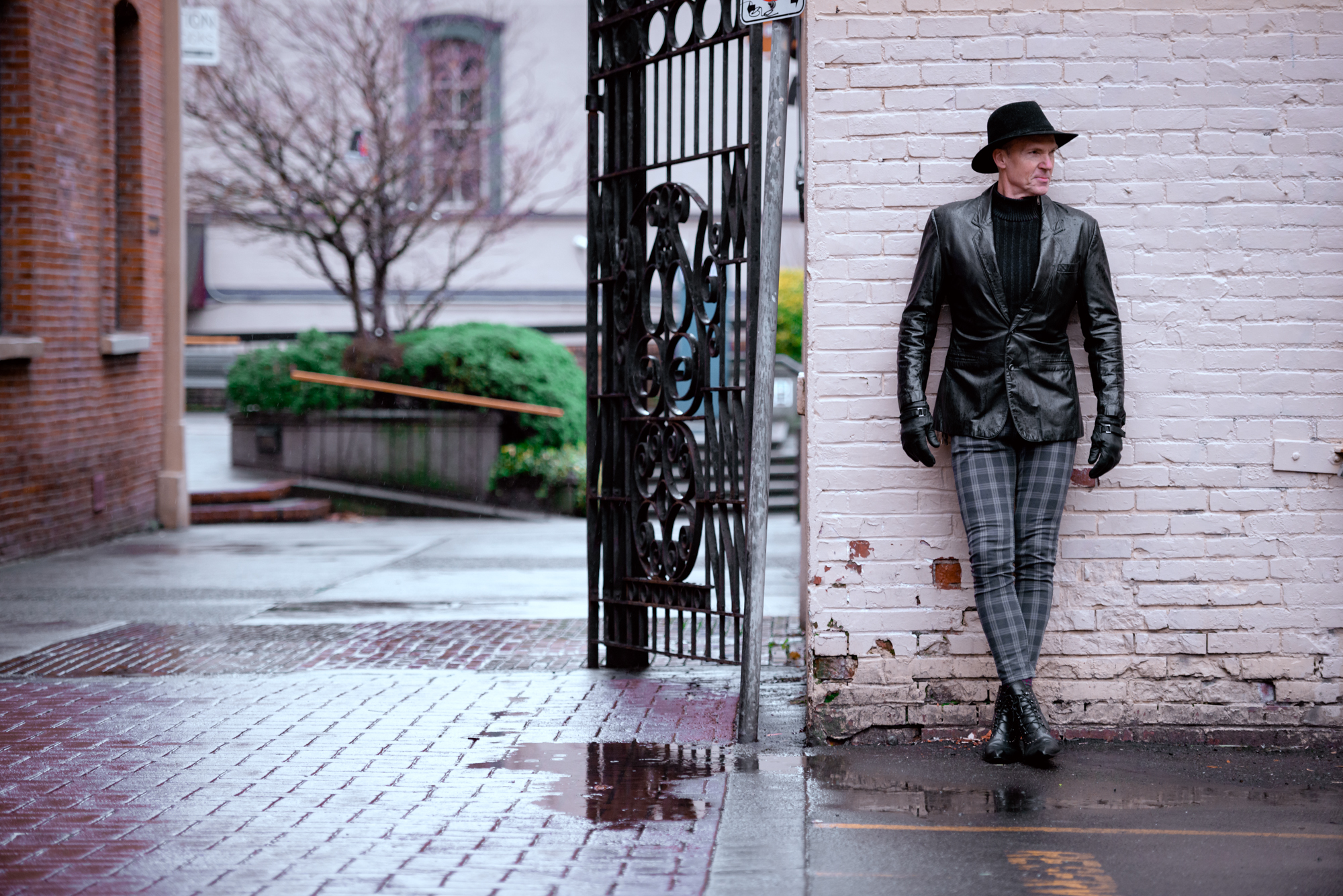 "Sleek Style: Paul Steele exuding confidence in John Fluevog shoes against the backdrop of Victoria, BC."