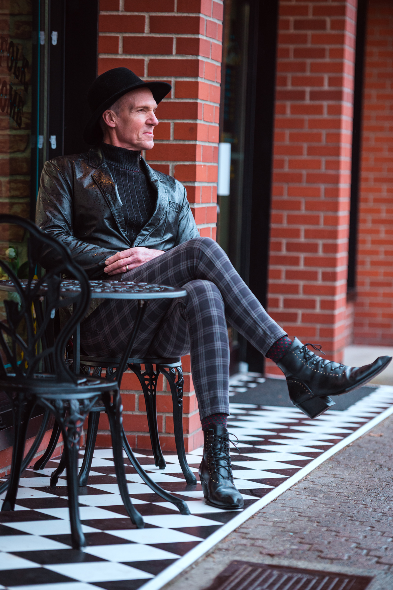 "Street Style Spotlight: Paul Steele making a fashion statement in Fluevog shoes on the lively streets of Victoria, BC."